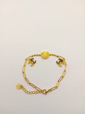 Chanel Złota Bransoletka z Logo - Elegancja i Styl