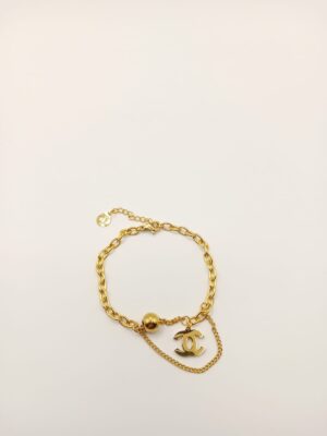 Chanel Złota Bransoletka z Logo - Elegancja i Styl